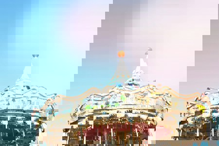 A merry-go-round against a blue sky