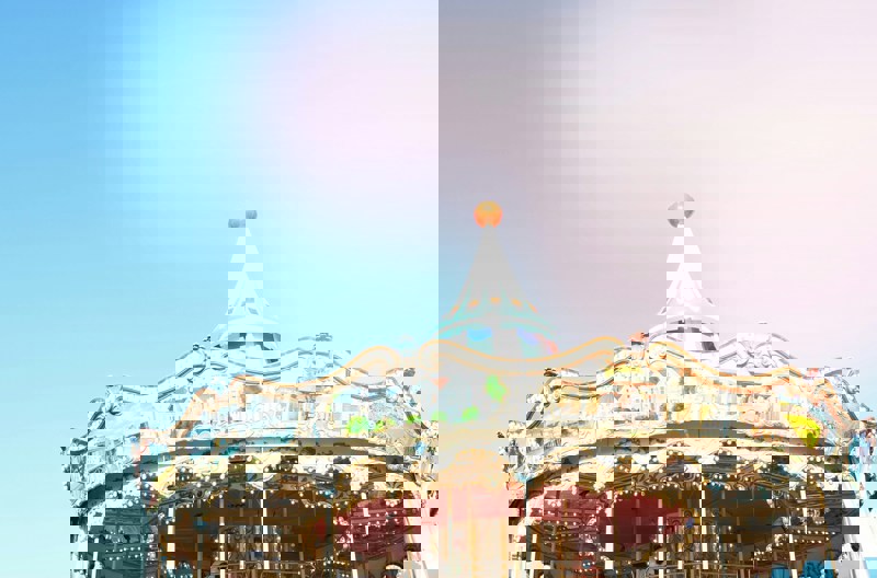 A merry-go-round against a blue sky