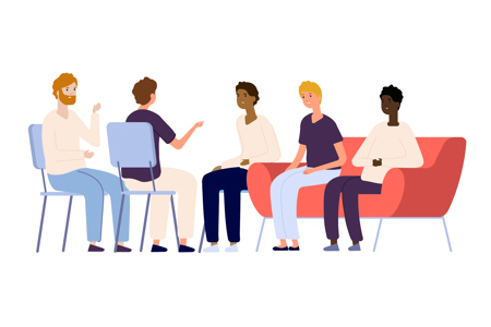 5 men, seated in chairs and armchairs, having a conversation